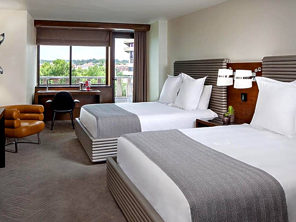 Interior of room at Watergate Hotel showing small 420 friendly balcony